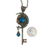 Handmade Magical fantasy moon key necklace with high quality blue crystals.  This unique piece of Fantasy key jewelry makes the perfect sparkly gift!