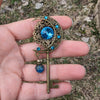 Handmade Magical fantasy moon key necklace with high quality blue crystals.  This unique piece of Fantasy key jewelry makes the perfect sparkly gift!