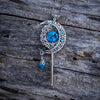 Handmade Magical fantasy moon key necklace with high quality blue crystals.  This unique piece of Fantasy key jewelry makes the perfect sparkly gift!