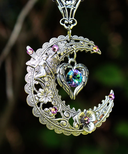 Magical  Sterling Silver Vintage Fairy on Crescent Moon necklace with  a heart and Swarovski crystals.  Fantasy jewelry lover gift.