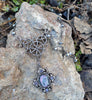 Unique Silver Celtic Styled Gothic Necklace with Mystic Stone and purple crystals