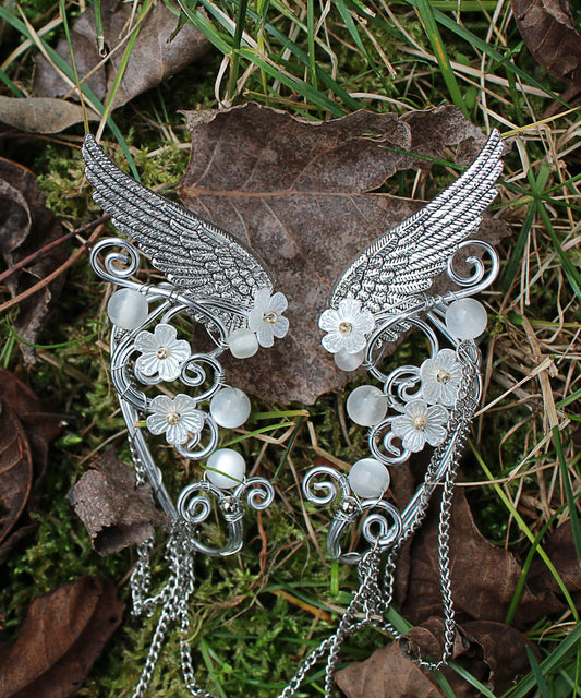 Elf fantasy ear cuffs with flowers and shoulder-length chains.  Elven jewelry.