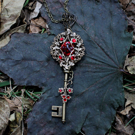 Elven floral bronze fantasy key necklace made with Scarlet Swarovski crystals.  Fantasy jewelry gift.