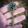 Bronze Elven Fantasy Key Necklace Jewelry made with Emerald Swarovski Crystals.