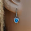 925 Sterling Silver Blue Topaz Cubic Zirconia Heart Earrings.