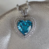 925 Sterling Silver Blue Topaz Cubic Zirconia Heart Pendant Necklace.