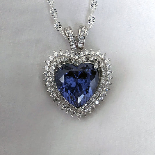 Sterling Silver Tanzanite Heart Necklace with Cubic Zirconia Stones.